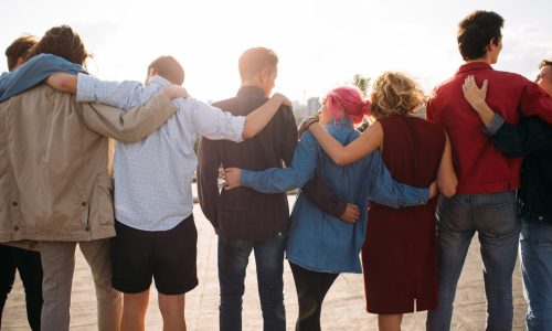 grupo personas diversas unidad apoyo amistad espalda